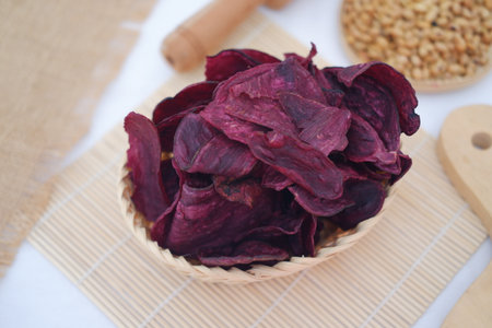 purple sweet potato chips in a rattan basket