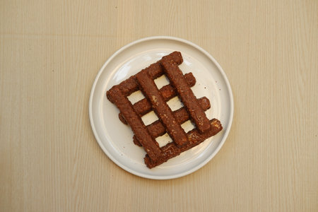 Chocolate wafers on a white plate, close-up