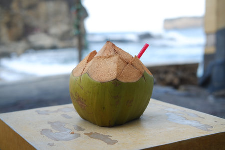 Coconut on the beach. Selective focus