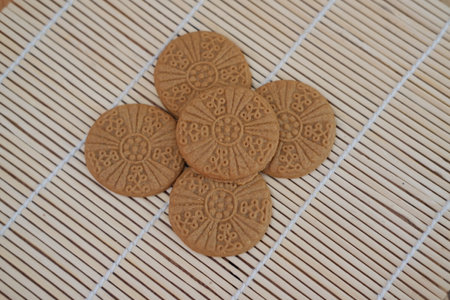cookies on a bamboo mat, shallow depth of field.の写真素材