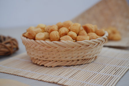 a traditional cake from Indonesia called kue sus filled with cream puffsの写真素材