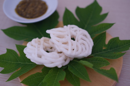 Fresh made Prawn Crackers  on leafの写真素材