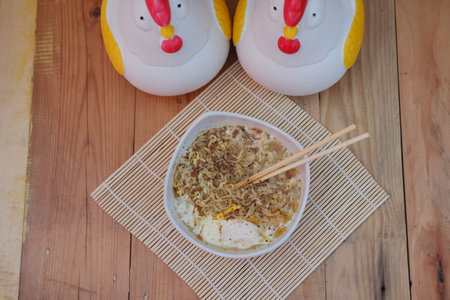 noodles soup with fried eggs. Spicy sauceの写真素材