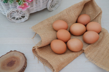 egg on gunny sack with a wooden background