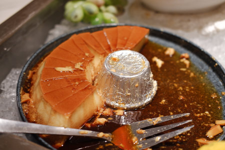 The pudding features a shiny caramel layer on topの写真素材