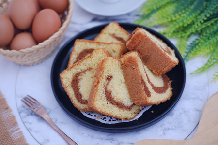 sponge cake on a plate with beautiful decorationの写真素材