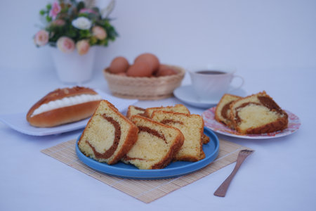 sponge cake on a plate with beautiful decorationの写真素材
