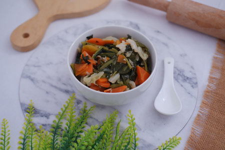 Colorful Veggie Delight in a White Bowlの写真素材