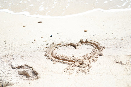 a heart shape drawn in the softの写真素材