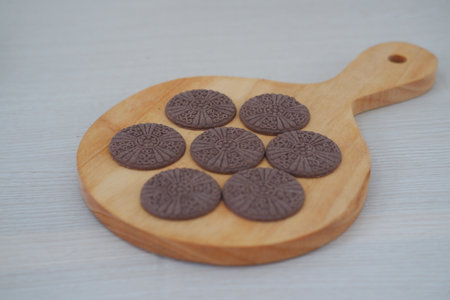 The decorative pattern on each cookie adds charmの写真素材