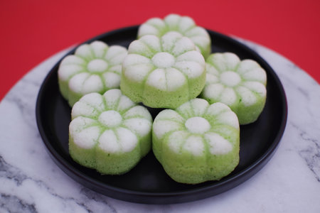 set of traditional Indonesian steamed cakes called putu ayuの写真素材