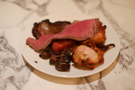 Freshly Cut Barbecue beef on a Plateの写真素材