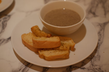 Creamy Mushroom Soup with Garlic Bread Slicesの写真素材