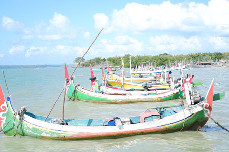 Colorful fishing boats on the coast of Maduraの写真素材