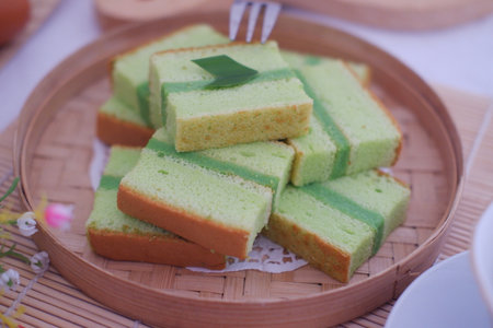 Green Layer Cake with Pandan Leaf Decorationの写真素材