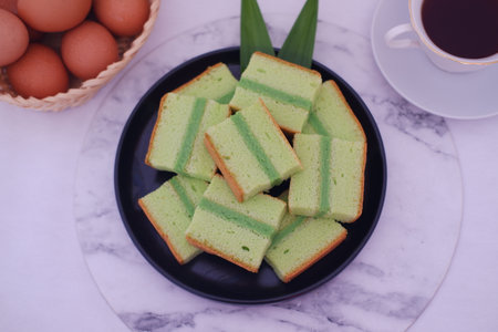 Pandan Sponge Cake with Fresh Eggs and Teaの写真素材
