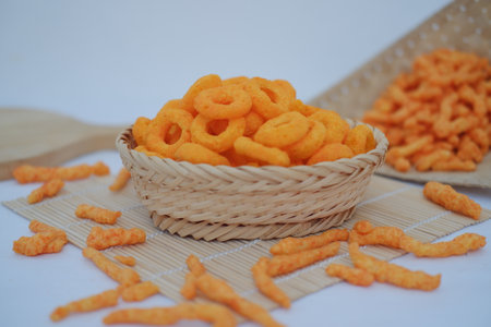 Popular Cheese Flavored Snack in Rustic Settingの写真素材