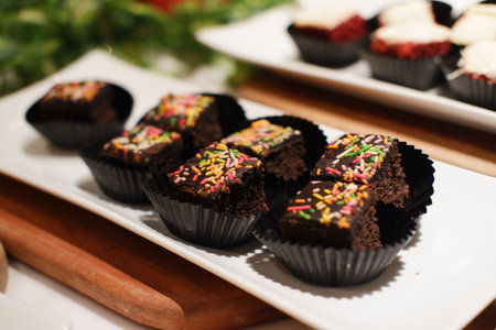 Delicious Chocolate Cake Bites Decorated with Sprinklesの写真素材