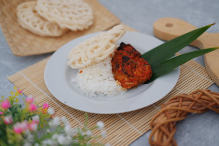 Indonesian Red Seasoned Chicken with White Riceの写真素材