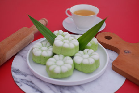 Delicious Kue Putu Ayu Indonesian Coconut Cakes with Teaの写真素材