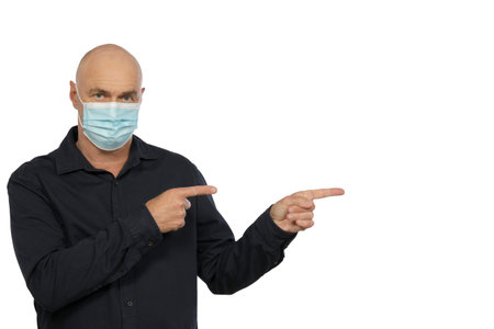 Man wearing a mask in studioの写真素材