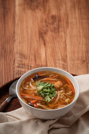Close up of delicious traditional thick soup with shrimp meat ball and vegetables in Taiwan.