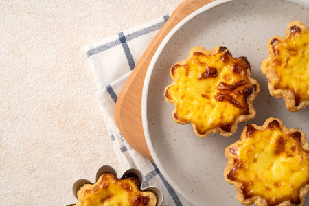 Delicious Portuguese egg custard tart puff pastry, Pastel de nata in flower shape.