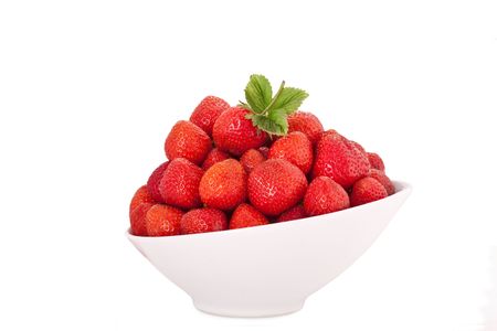 Bowl of Strawberries isolated on whiteの写真素材