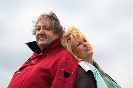 Handsome Senior Couple to stand back to back