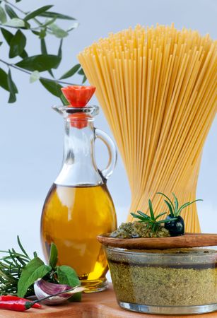 Authentic pesto sauce with its ingredients and Spaghetti. の写真素材