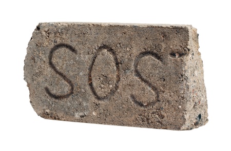 original SOS message in the old Dirty Broken Brick, Isolated on White Background