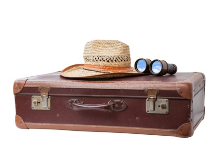 Old used suitcase with Hat and antique Binoculars  isolated on white background  の写真素材