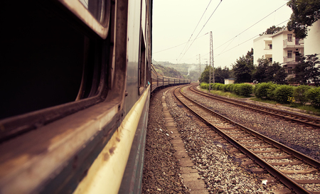 View of train tracks from the windowの写真素材