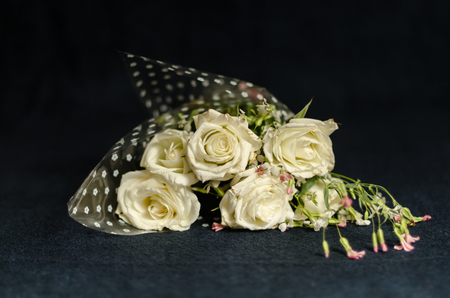 White bouquet with dark back groundの写真素材