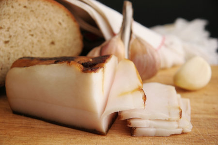 One of the most popular dishes in Ukrainian cuisine ( salo). Smoked salted pork fat with garlic and bread.の写真素材
