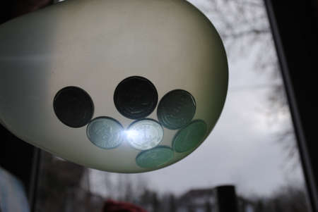 coins in a balloonの写真素材