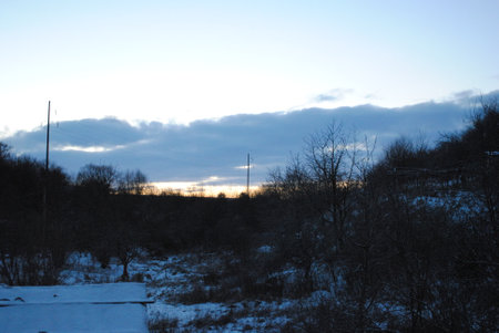 frosty winter evening after sunsetの写真素材