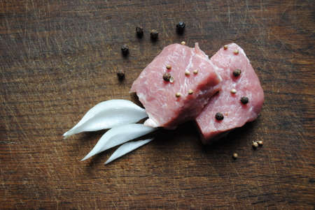 juicy appetizing meat with spices and onionsの写真素材