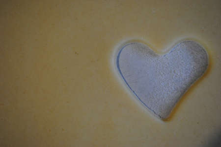 heart cut in dough, blank for cookiesの写真素材