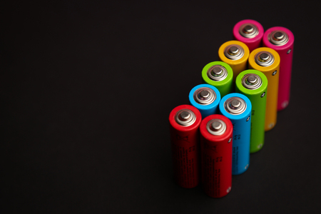 Energy abstract background set of colored alkaline AA size batteの写真素材