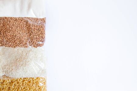 Stack of cereal and sugar products on a whiteの写真素材