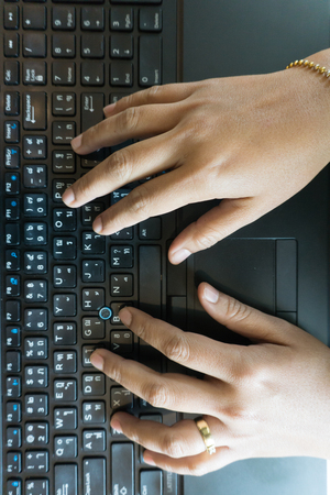 close up business women hand working with laptopの写真素材