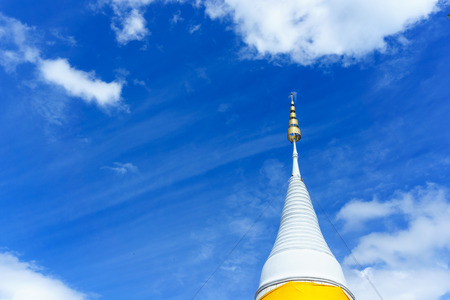 white pagoda with blue sky and cloud.の写真素材