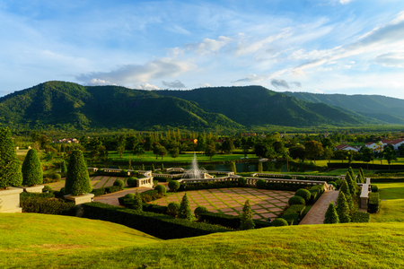 panorama view of public garden with blue sky and cloud and mountain background.の写真素材