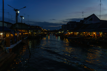 Amphawa,SamutSongkram. December 2 2017. landscape view of floating market in thailand at dusk in the evening when twilight at amphawa,samut songkram,thailand the most famous floating market.のeditorial素材