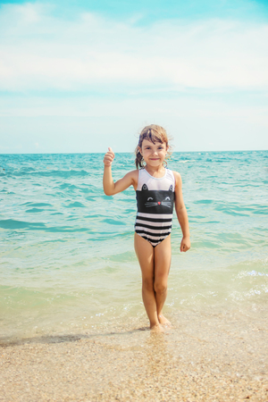 Child in the water sea. Selective focus.の写真素材