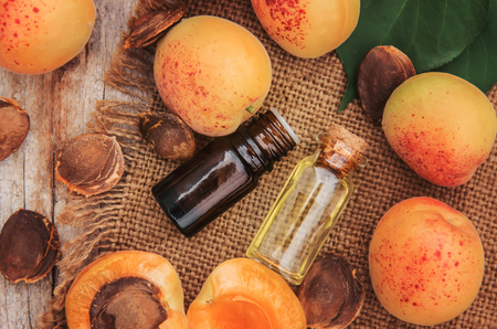 apricot oil in a small jar. selective focus. nature.の写真素材
