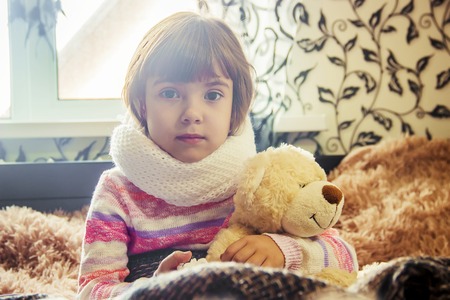 The child is sick and drinks a lot of tea. Selective focus. children.