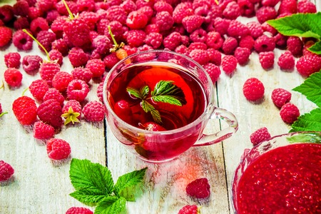 Raspberries on a wooden background. Selective focus. Teaの写真素材
