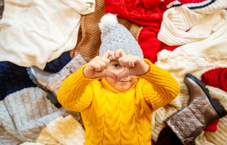 the child is dressed in winter clothes. selective focus. winter.の写真素材